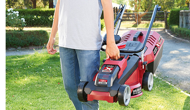  A battery-powered lawnmower that is carried